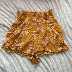 Urban Outfitters yellow and pink pattern shorts. Elastic waistband! Size Small
